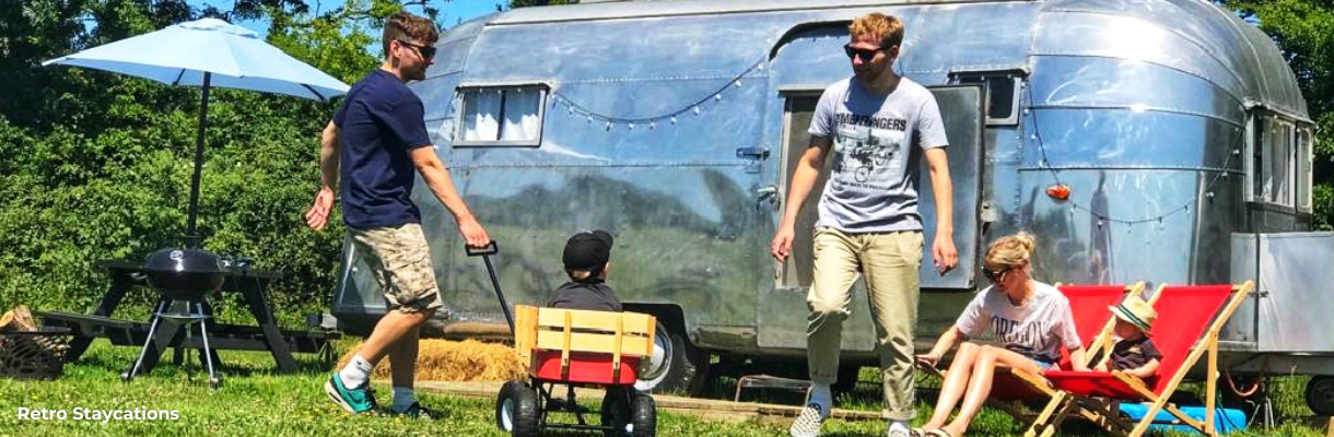 Family enjoying the outside area of the American Airstream at Retro Staycations on the Isle of Wight