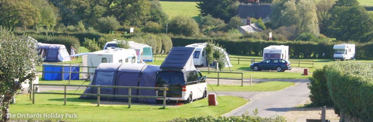 Touring caravans at The Orchards Holiday Park